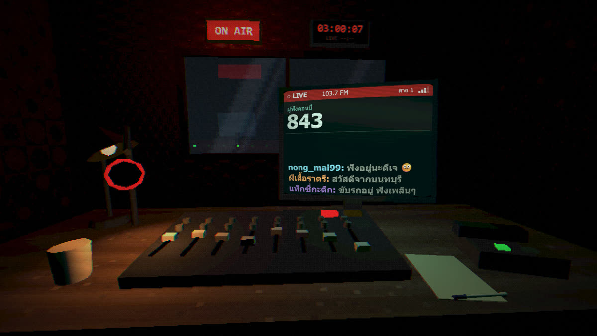 The studio at 3AM: ON AIR sign, clock, listener monitor and mixer